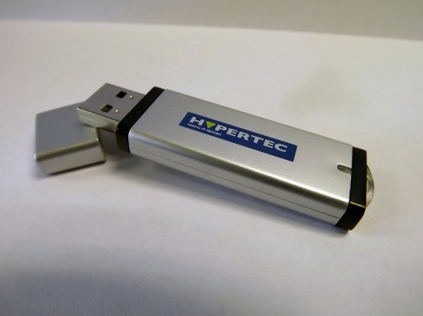 A Hypertec 64GB Slimline Hyperdrive - Encrypt Plus (256 bit AES encrypted flash drive with Autoexecuting lock program and no access to non encrypted storage)